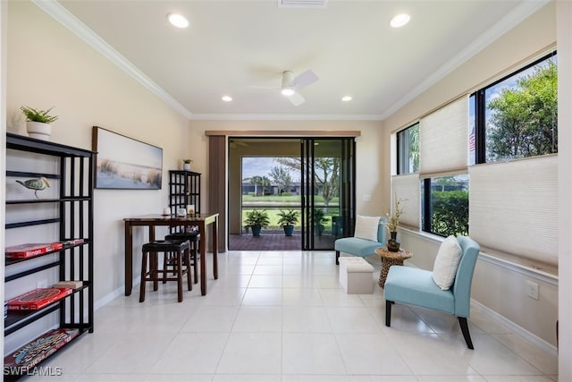 sitting room featuring ceiling fan, recessed lighting, baseboards, and ornamental molding