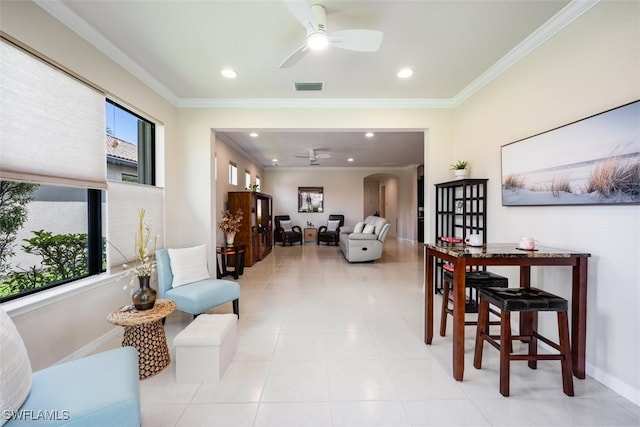 interior space featuring visible vents, baseboards, ceiling fan, ornamental molding, and recessed lighting