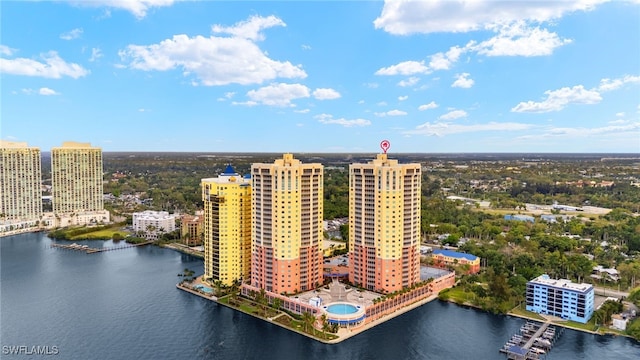 aerial view featuring a view of city and a water view