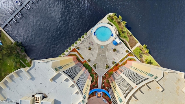 birds eye view of property featuring a water view