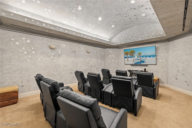 carpeted home theater room with recessed lighting, vaulted ceiling, and baseboards
