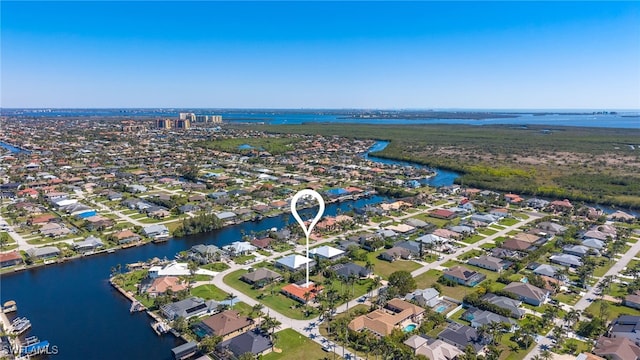 5305 SW 25th Ct, Cape Coral, FL 33914 - aerial view of property's location featuring a nearby body of water and nearby suburban area