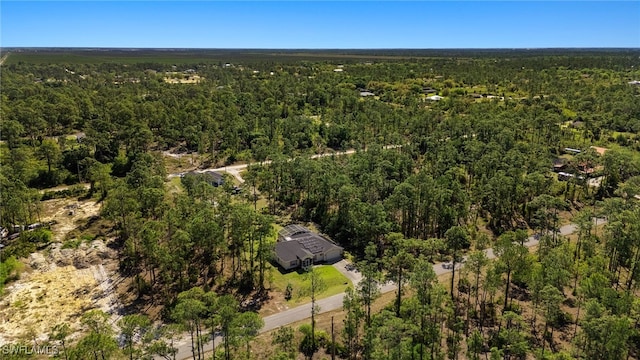 aerial view featuring a forest view