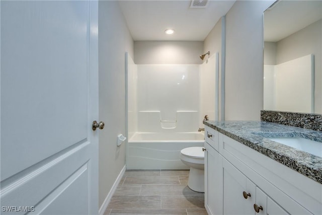 full bath with baseboards, visible vents, toilet, tub / shower combination, and vanity