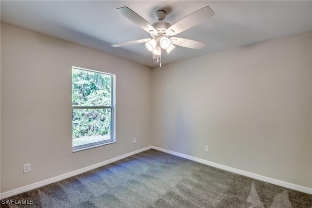 unfurnished room featuring ceiling fan, baseboards, and carpet flooring