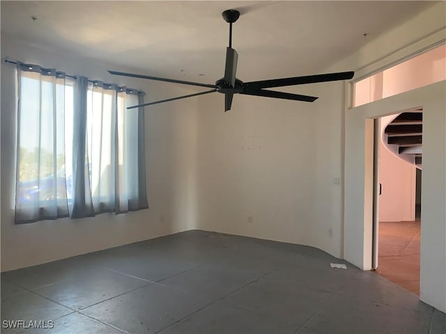 spare room featuring ceiling fan