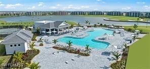 view of pool with a water view