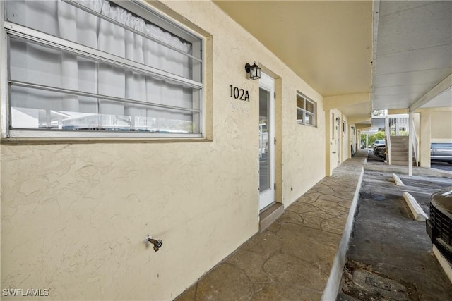 exterior space with stucco siding