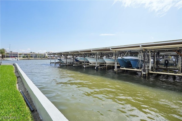 view of dock featuring a water view and boat lift