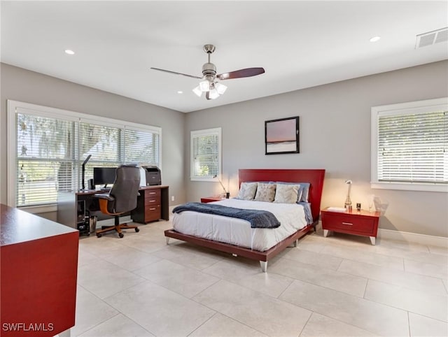 bedroom featuring light tile patterned floors, baseboards, visible vents, and recessed lighting