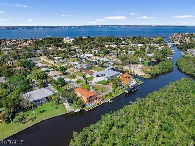 aerial view with a water view and a residential view