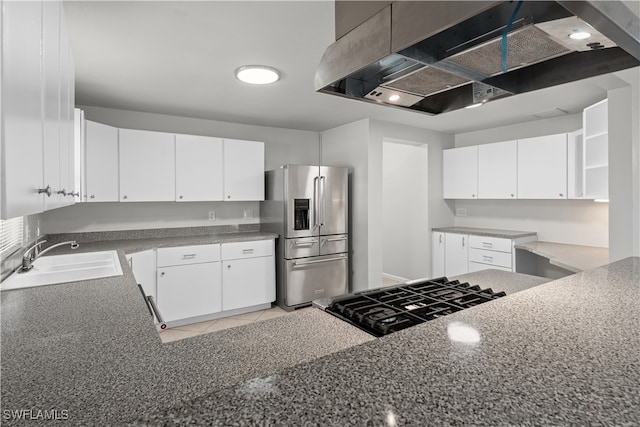 kitchen featuring a sink, white cabinets, wall chimney range hood, stainless steel fridge with ice dispenser, and open shelves