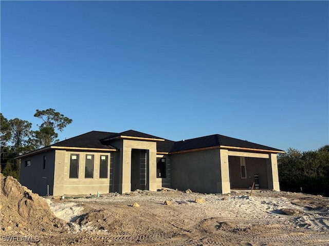 view of front of home with stucco siding