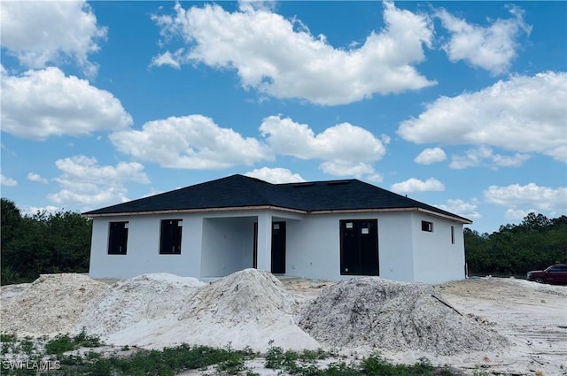 1821 Hines Ave, Lehigh Acres, FL 33972 - view of front facade featuring stucco siding
