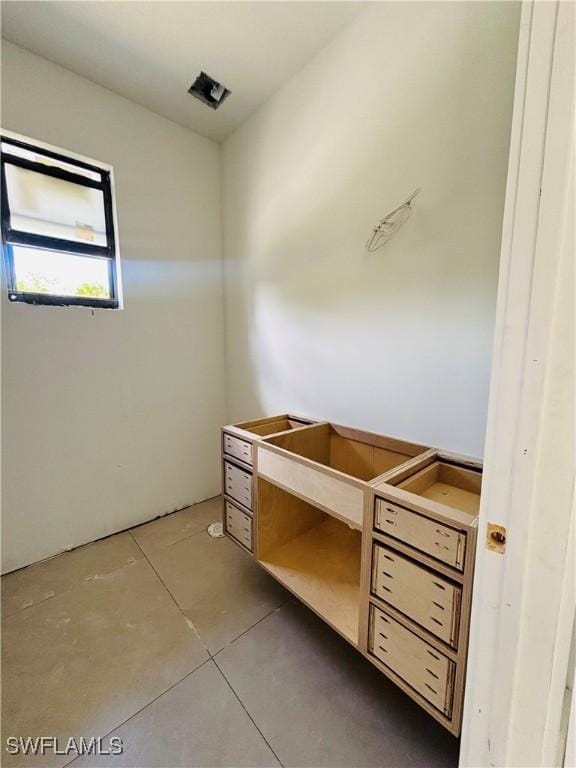 1821 Hines Ave, Lehigh Acres, FL 33972 - unfurnished office featuring light tile patterned flooring