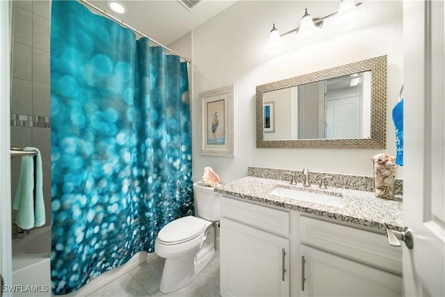 full bath with vanity, toilet, and tile patterned floors