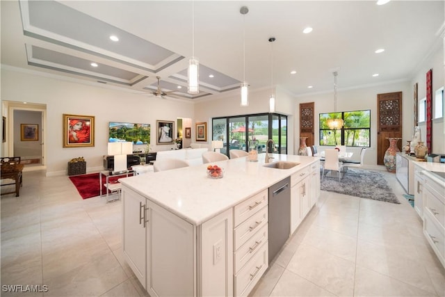 kitchen featuring open floor plan, crown molding, plenty of natural light, and dishwasher