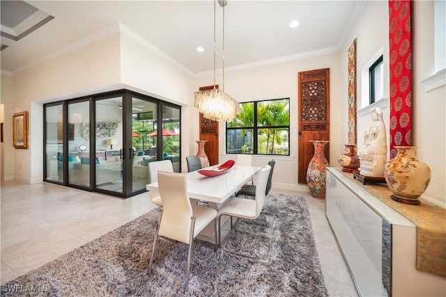 dining area with baseboards, ornamental molding, and recessed lighting