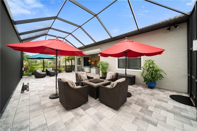 view of patio / terrace with a lanai, a wall mounted AC, and an outdoor hangout area