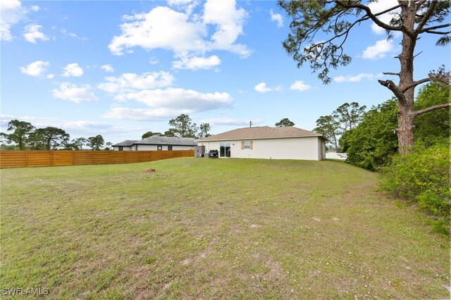 5011 Dania Cir, Labelle, FL 33935 - view of yard featuring fence