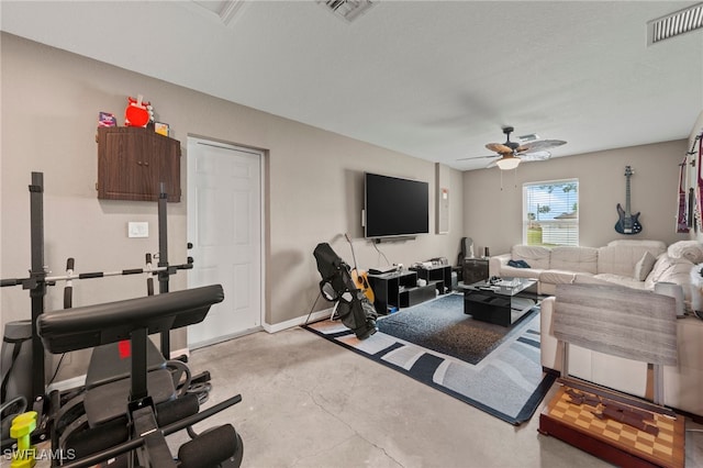 5011 Dania Cir, Labelle, FL 33935 - living area with baseboards, concrete floors, visible vents, and ceiling fan