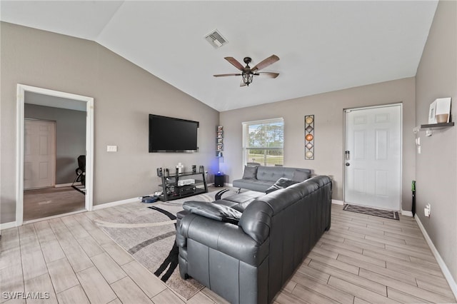 5011 Dania Cir, Labelle, FL 33935 - living area with vaulted ceiling, a ceiling fan, visible vents, and wood tiled floor