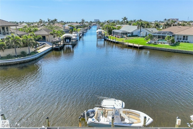 exterior space with a residential view and a dock