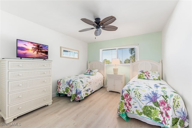 bedroom featuring ceiling fan and wood finished floors