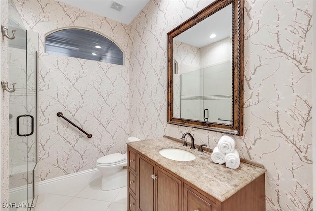 full bath with wallpapered walls, toilet, tile patterned floors, vanity, and a shower stall