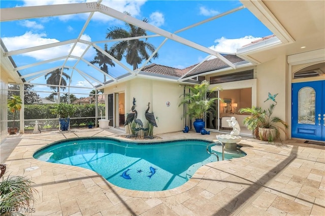 pool with a patio area