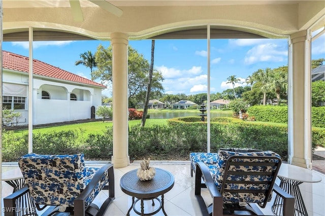 sunroom with a water view