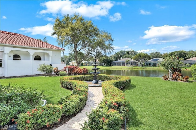 view of yard with a water view