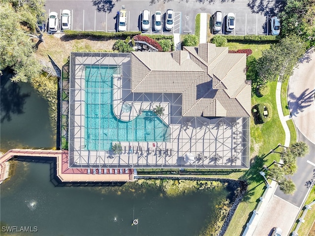 birds eye view of property featuring a water view