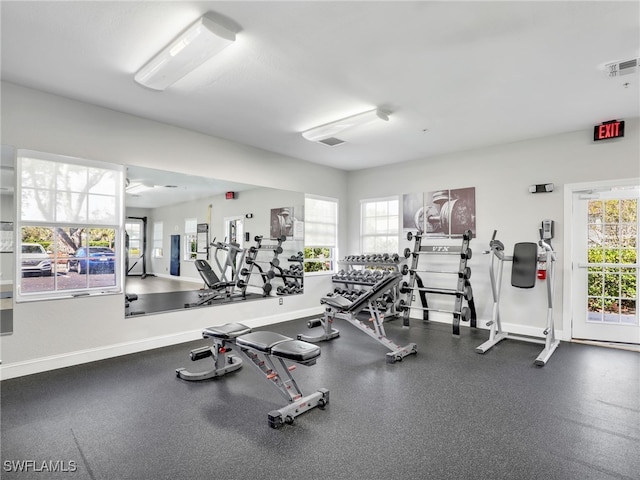 workout area with baseboards and visible vents