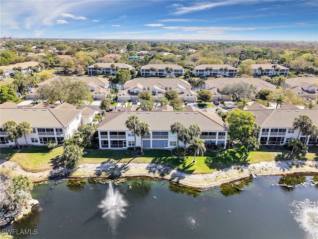 bird's eye view with a water view and a residential view