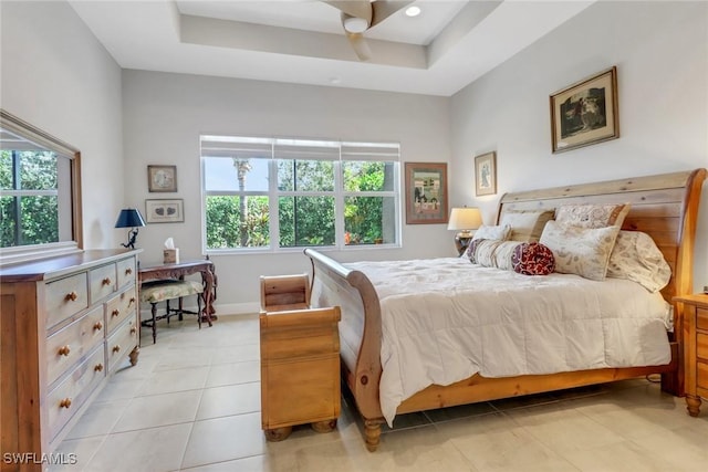 28589 Wharton Dr, Bonita Springs, FL 34135 - bedroom featuring a ceiling fan, a raised ceiling, baseboards, and light tile patterned floors