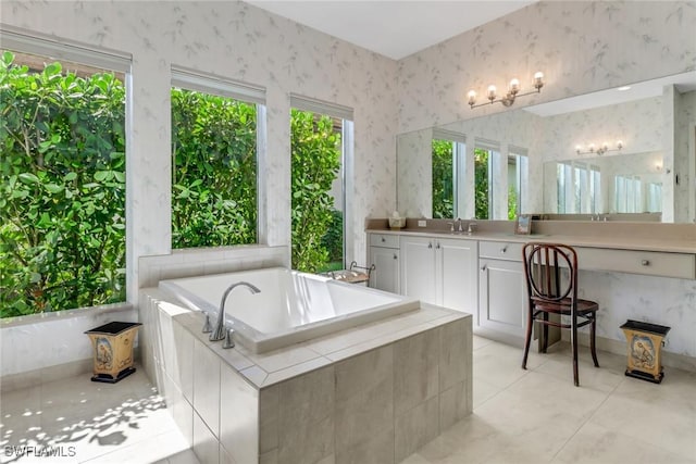 28589 Wharton Dr, Bonita Springs, FL 34135 - full bathroom with a relaxing tiled tub, tile patterned flooring, vanity, and wallpapered walls