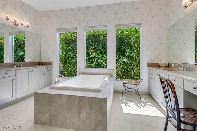 28589 Wharton Dr, Bonita Springs, FL 34135 - full bath with wallpapered walls, tile patterned flooring, a garden tub, and two vanities