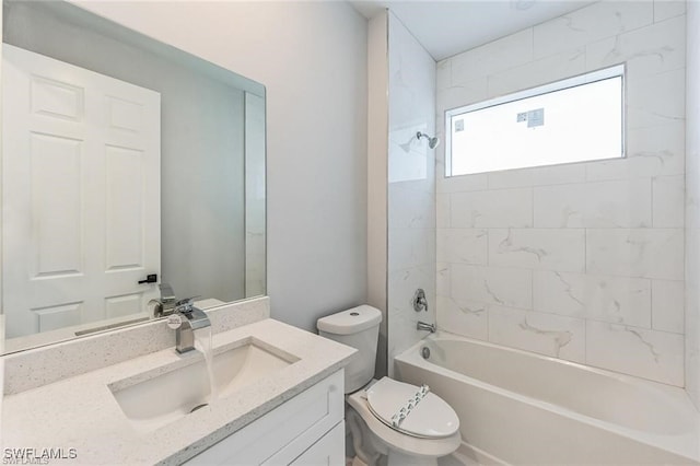 full bathroom with shower / bathing tub combination, vanity, and toilet