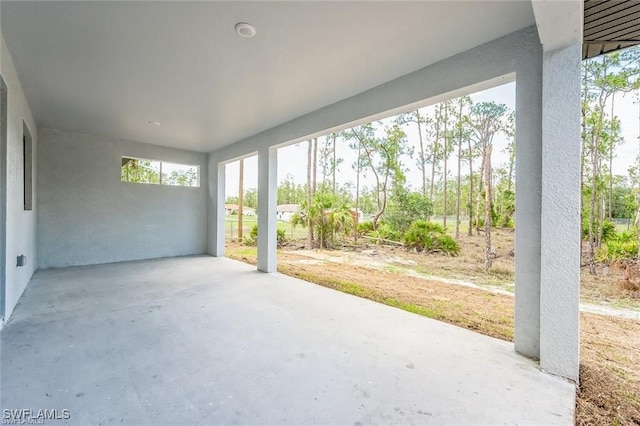 view of patio featuring a carport