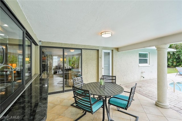 view of patio featuring outdoor dining space