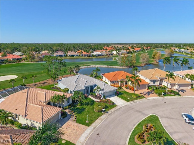 aerial view featuring a residential view and a water view