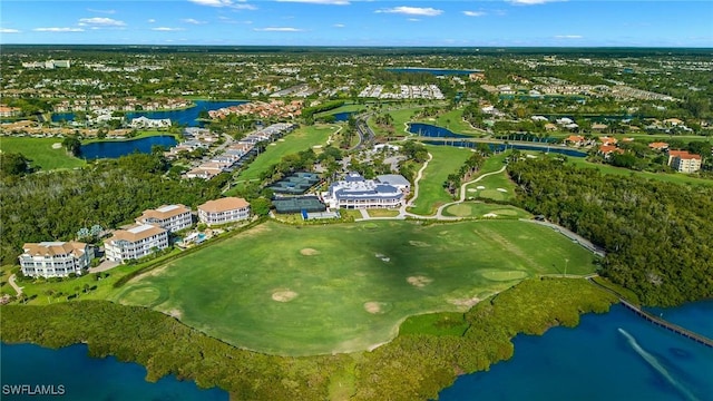 bird's eye view with view of golf course and a water view