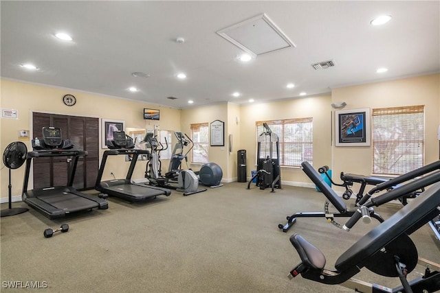 workout area featuring baseboards, visible vents, and recessed lighting