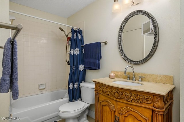 full bath with vanity, toilet, and shower / tub combo with curtain