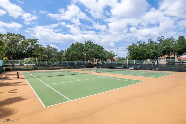 view of sport court featuring community basketball court and fence