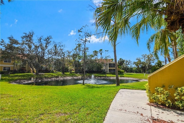 view of yard with a water view