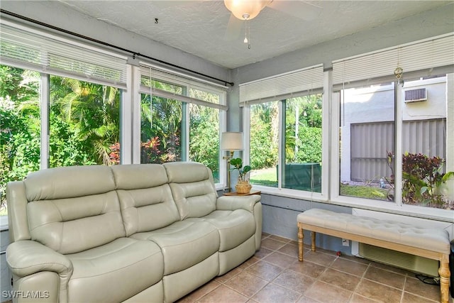 sunroom with ceiling fan