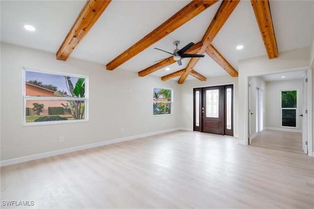 foyer entrance with recessed lighting, light wood-style flooring, and baseboards