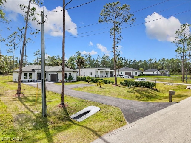 view of front of house with a front lawn